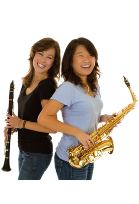 girls playing saxophone and clarinet